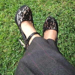 Nude and black Mary Jane heels